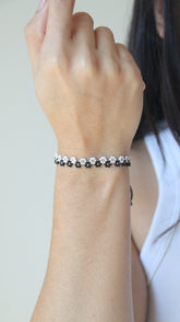 BLACK AND WHITE BLOSSOM BRACELET
