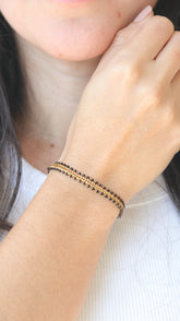 BLACK AND GOLD SPICA BRACELET