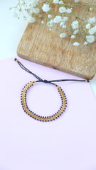 BLACK AND GOLD SPICA BRACELET